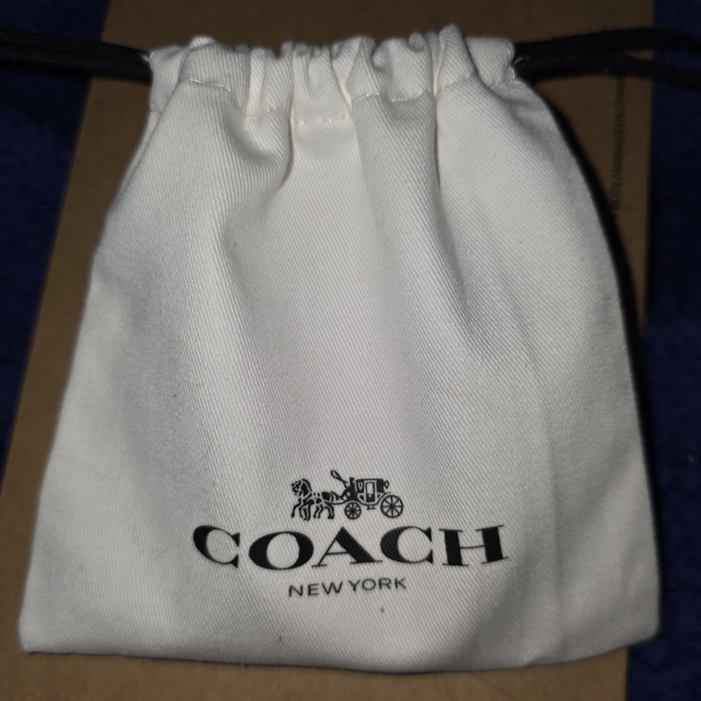 COACH Silver And Orange Daisy Pendant Necklace - Picture 6 of 6